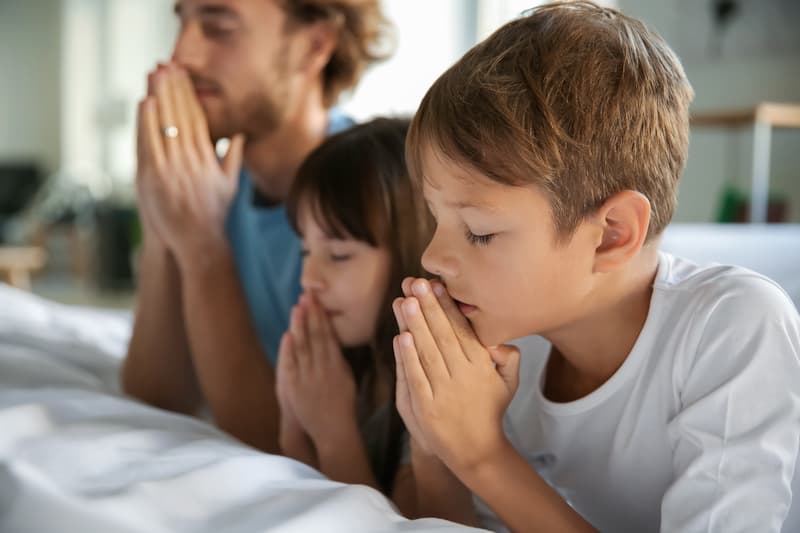 Father and Children Praying